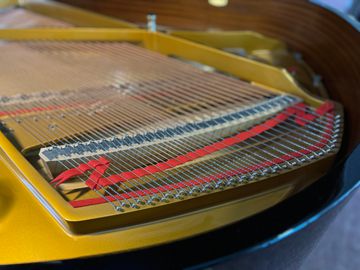 Black Shigeru Kawai SK 2 piano close up