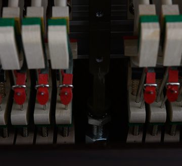 Danemann DU-110 Upright Piano hammers close-up