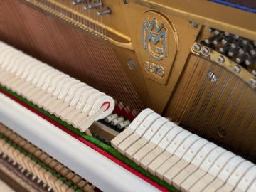Inside a Welmar Compact Upright Piano