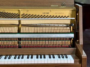 Close-up of a Yamaha LU-101 Upright Piano