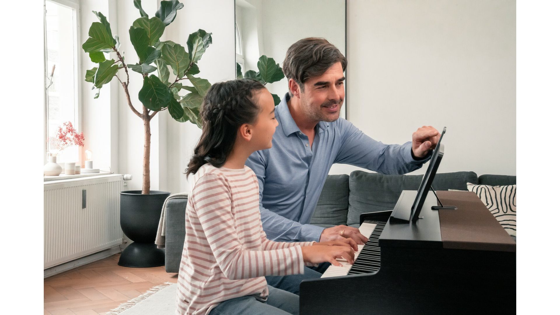Couple playing Kawai CN201 Piano