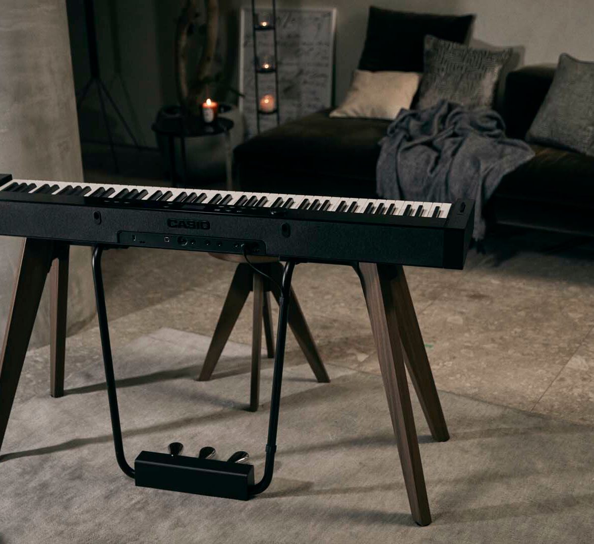 Casio PX-S7000 black digital piano on stand